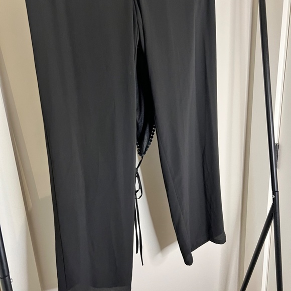 BLACK HALTER FIT AND FLARE JUMPSUIT - Picture 3 of 3